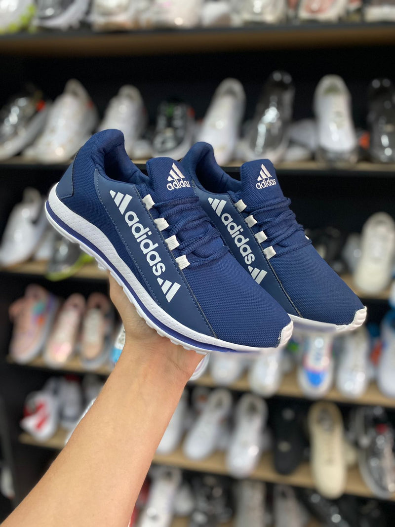 Tênis Adidas F1 - Masculino & Feminino