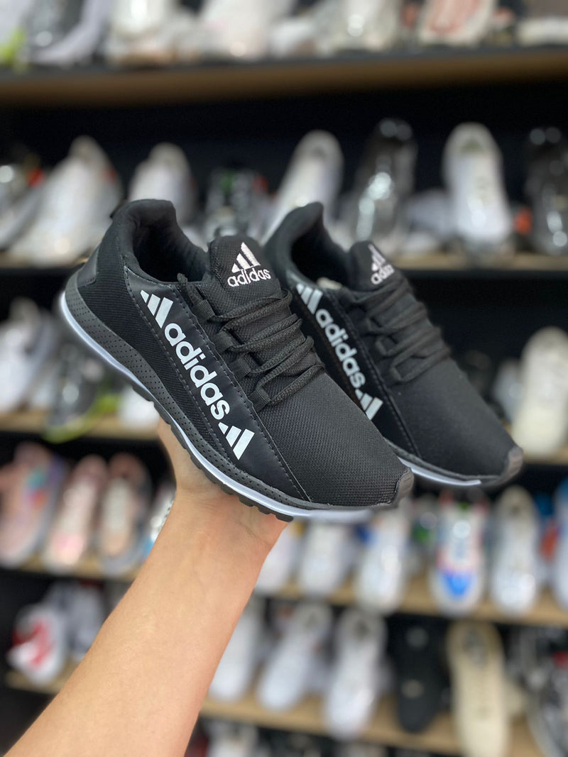 Tênis Adidas F1 - Masculino & Feminino